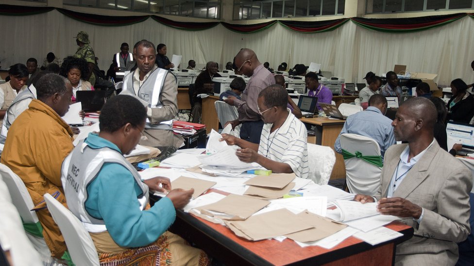 Malawi Electoral Commission workers recount votes during the national elections, 24 May 2014